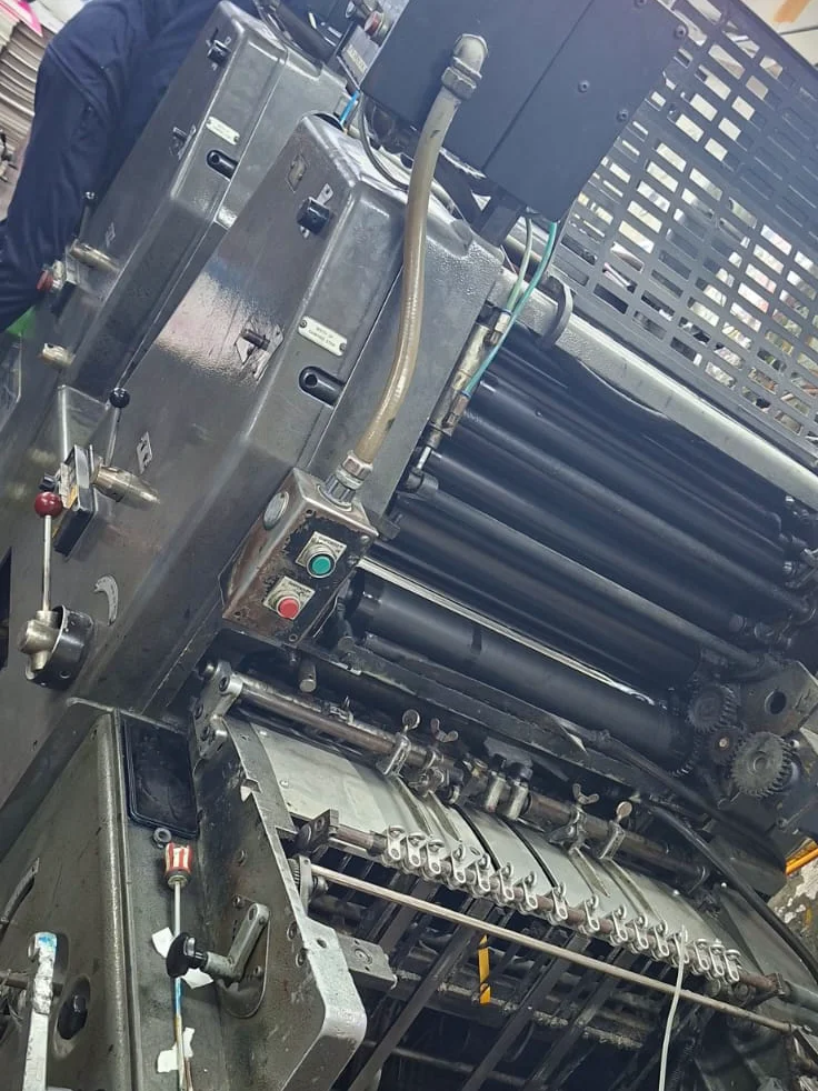 Heidelberg offset press rollers running a print job in our factory