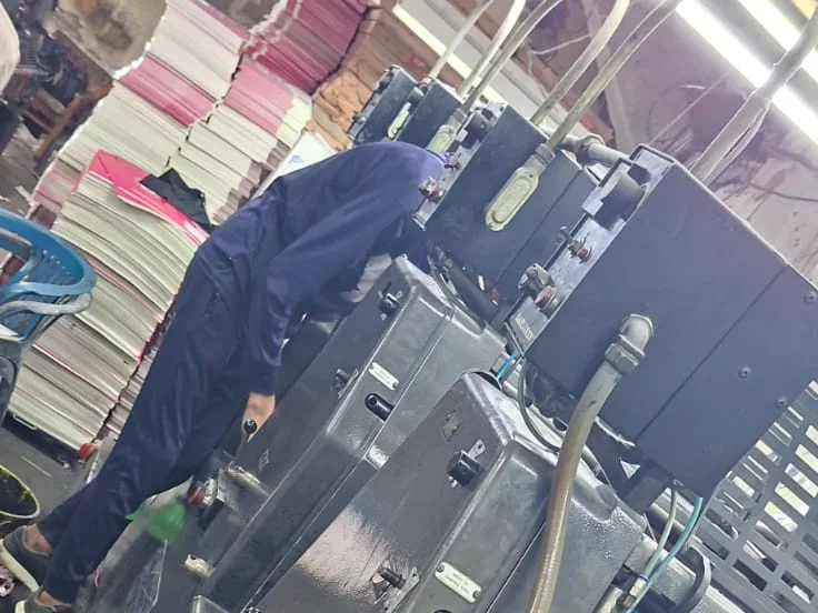 Our offset press producing printed stationery on the factory floor